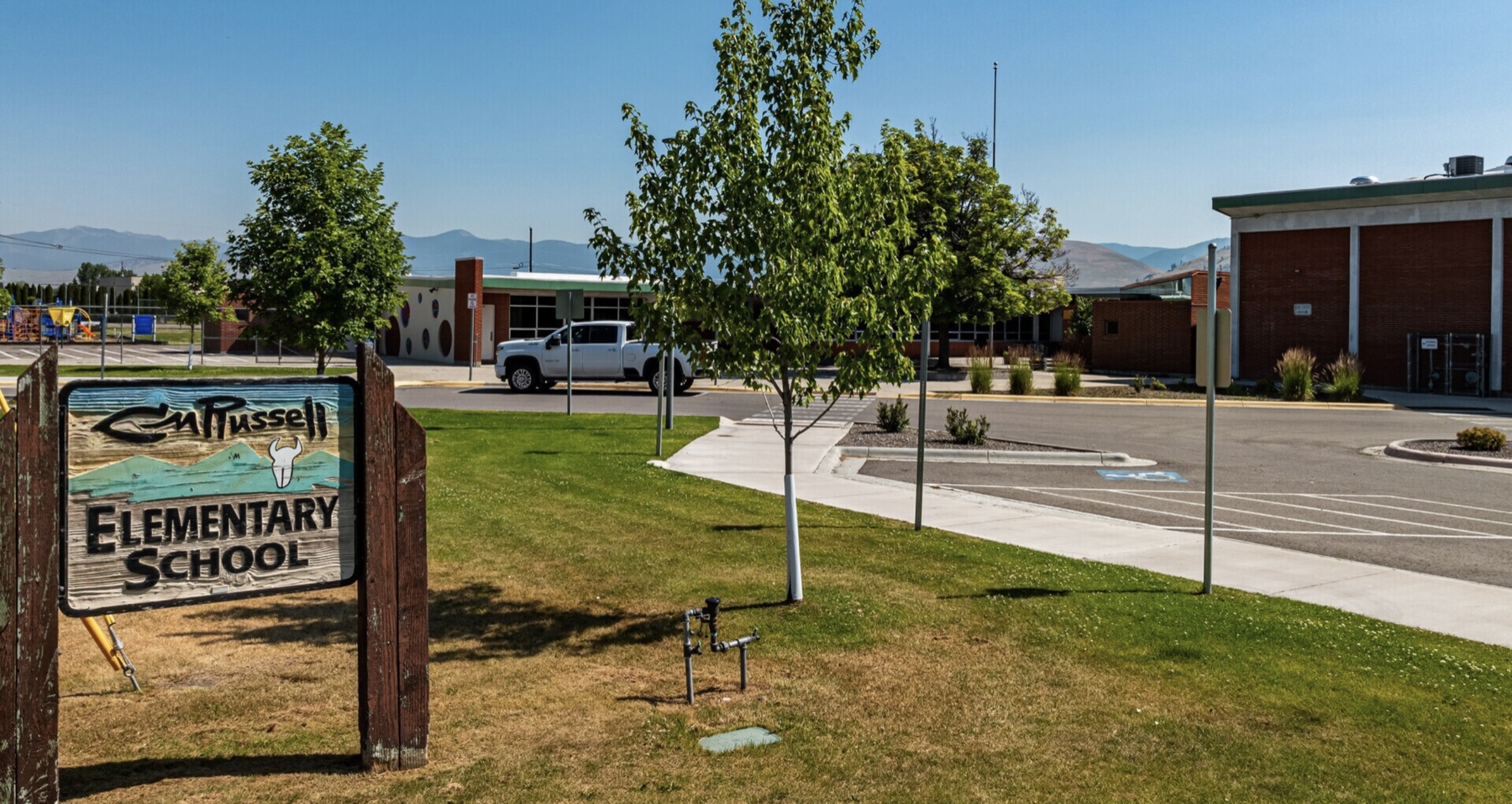 Russell Elementary School and its hand-painted entrance sign